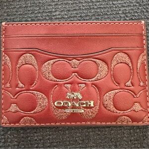 NWOT Coach Red Card Holder. Maroon/glittery signature C credit card holder.